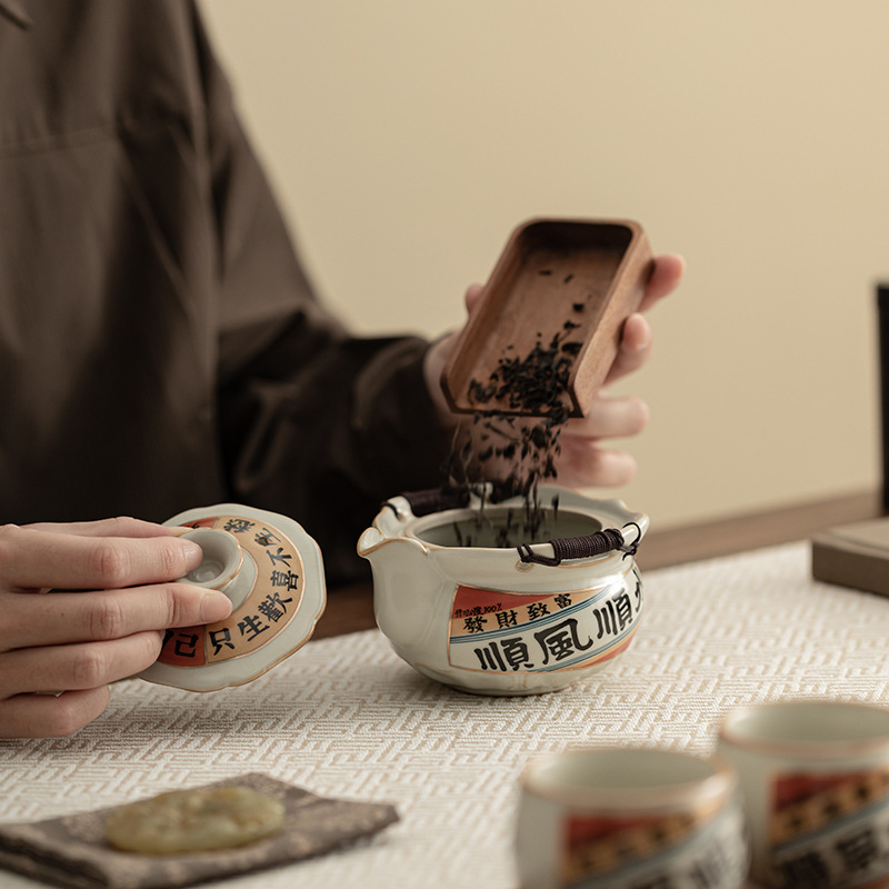 Bộ ấm trà du lịch một ấm ba cốc có thể nâng cốc trà lò Ru cổ cầm tay ấm trà cầm tay
