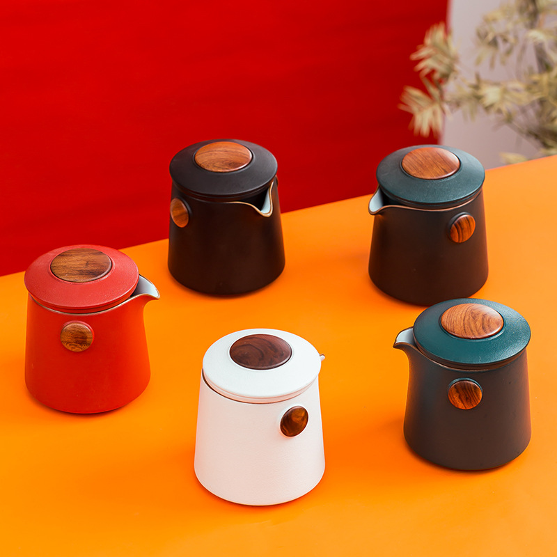 Bộ trà Bộ trà gốm sứ nhanh Bộ trà du lịch cầm tay một ấm bốn ly quà tặng doanh nghiệp quà lưu niệm lễ hội