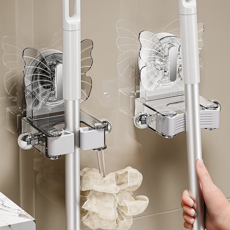 Giá đỡ cây lau nhà hình con bướm, gắn tường bằng cốc hút, có móc treo, không cần khoan.