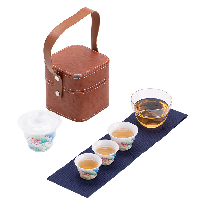 Bộ trà du lịch hoa sen bằng sứ ngọc bích phong cách Trung Quốc mới ngoài trời di động nhanh cốc gốm sứ một bát ba cốc trà
