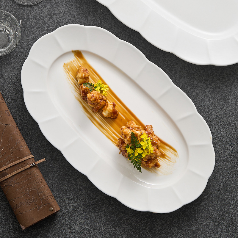 Đĩa gốm cao cấp cảm giác ẩm thực gia dụng đĩa ăn sáng tạo bộ đồ ăn khách sạn đĩa hình bầu dục cỡ lớn đĩa đựng cá viền hoa