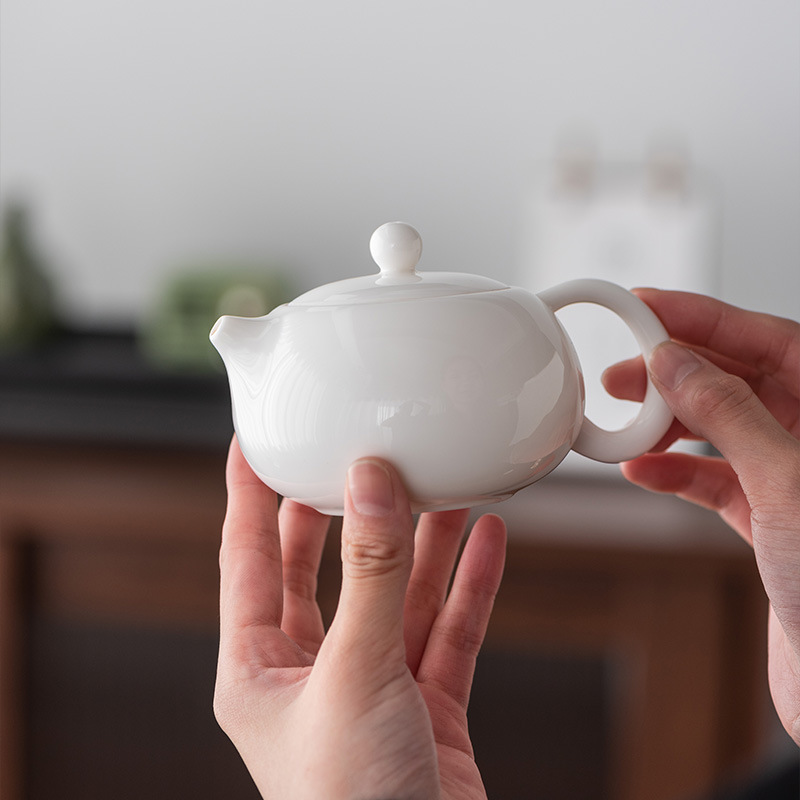 Ấm trà ngọc bích mỡ cừu sứ trắng Dehua ấm pha trà gia dụng ấm đơn bộ trà Kung Fu ấm tay cầm bên ấm Xi Shi bán buôn
