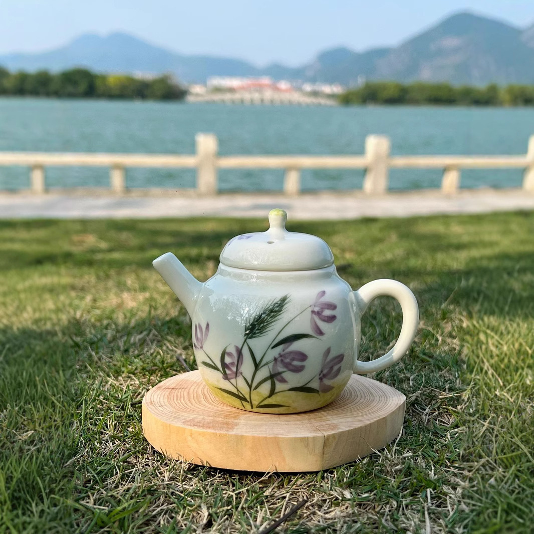 Ấm trà gốm sứ lan vẽ tay để pha trà, nồi cầm tay gia đình nhỏ tráng men Trung Quốc, bộ trà kung fu nồi đơn