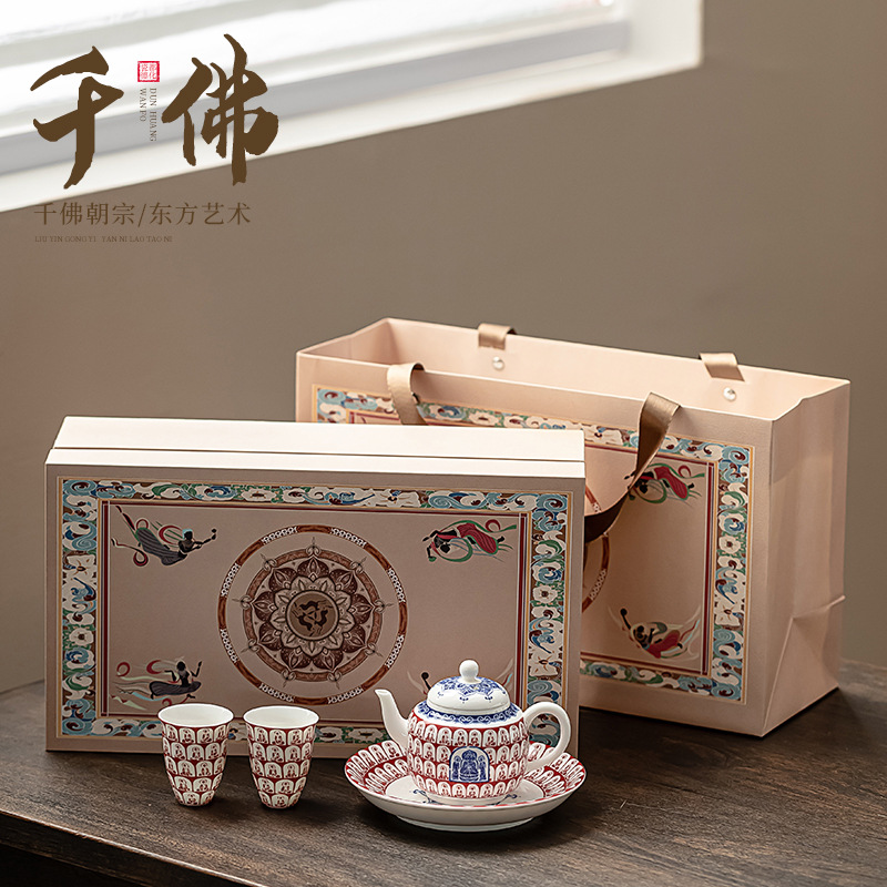 Bộ ấm trà một ấm hai cốc Đôn Hoàng Ngàn Phật Đồ pha trà gia dụng văn hóa và sáng tạo gốm sứ Trung Quốc Ấm trà cốc trà hộp quà