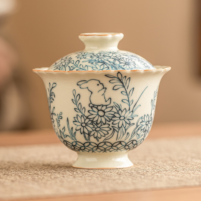 Hoa hướng dương dễ thương thỏ hai nắp bát pha trà bát bộ trà Kung Fu cao cấp Trung Quốc hộp quà tặng bát trà gia dụng gốm sứ có nắp