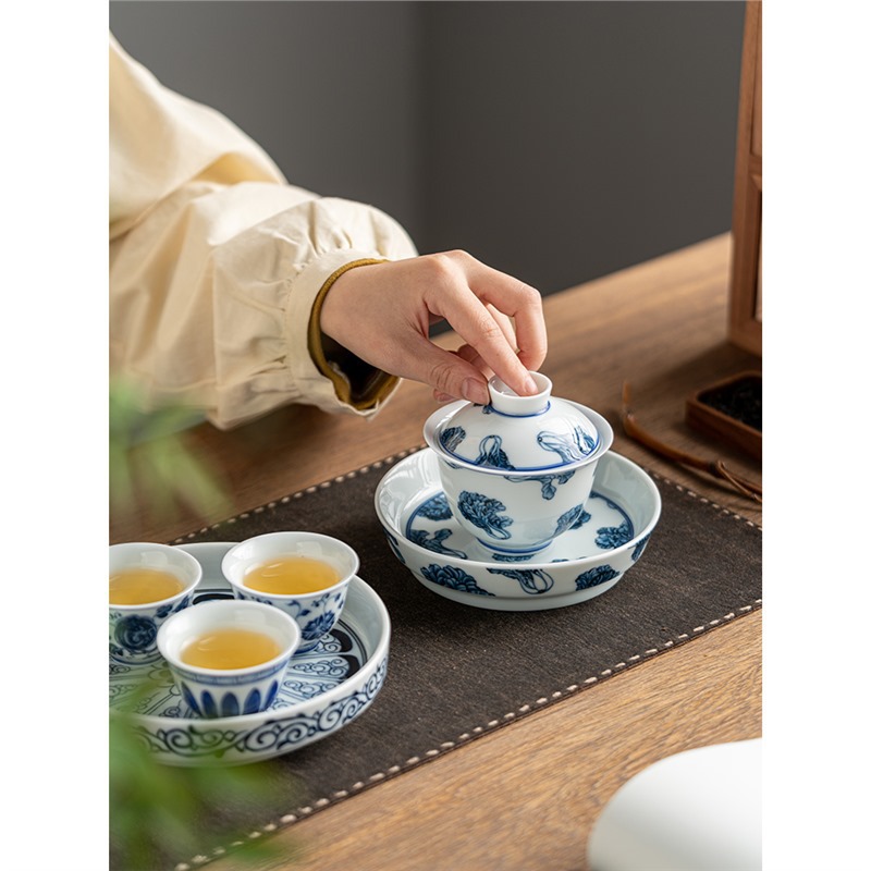 Tượng Phật Đôn Hoàng Phong cảnh Sứ trắng xanh dưới men màu Bộ trà Kung Fu Gốm sứ cổ điển Trà ba tài năng Bát trà