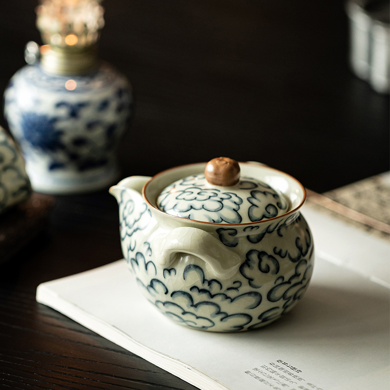 Ấm cầm tay Xiangyun cổ ấm trà gốm sứ Ấm pha trà dung tích lớn không nóng ấm lò Ru có thể dùng để nâng cao Bộ trà Kung Fu