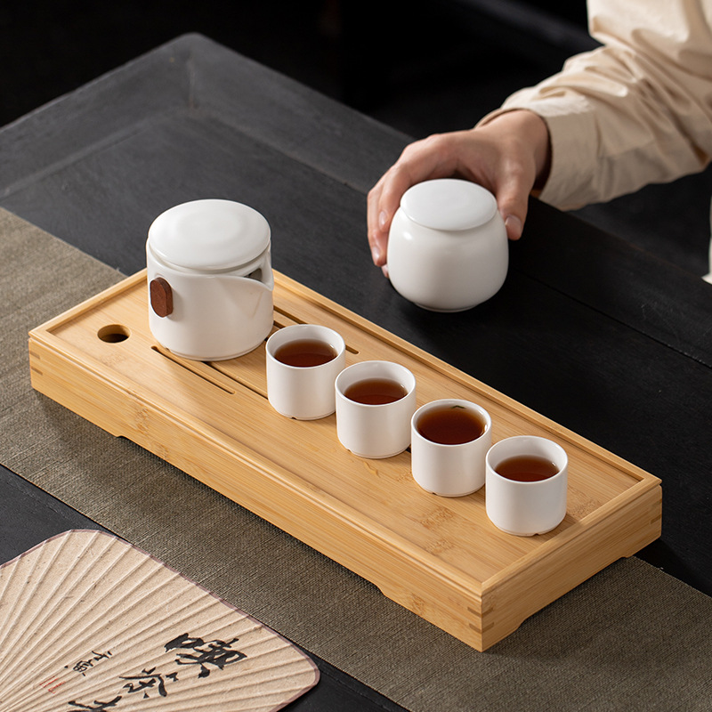 Bộ dụng cụ trà và trà Kung Fu kinh doanh Aoyong Một lon Kung Fu Guild Gặp gỡ và một hộp quà gốm sứ kèm bình bốn cốc