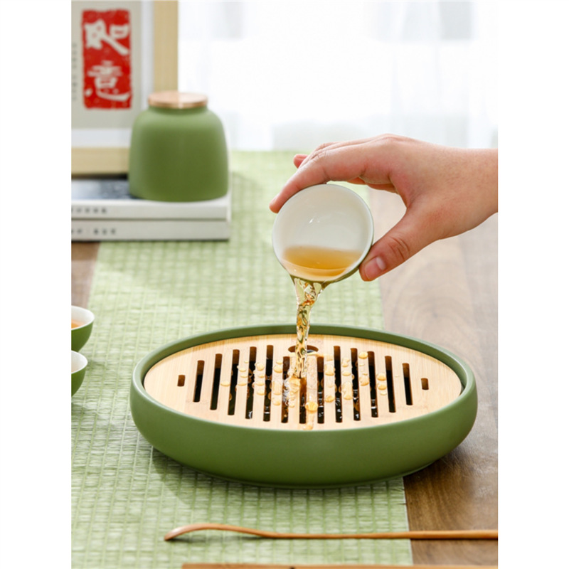 Khay trà gốm sứ pha khô gia dụng cao cấp tinh tế giá trị cao phong cách Trung Quốc mới cổ điển hình tròn sáng tạo khay trà trữ nước bán buôn