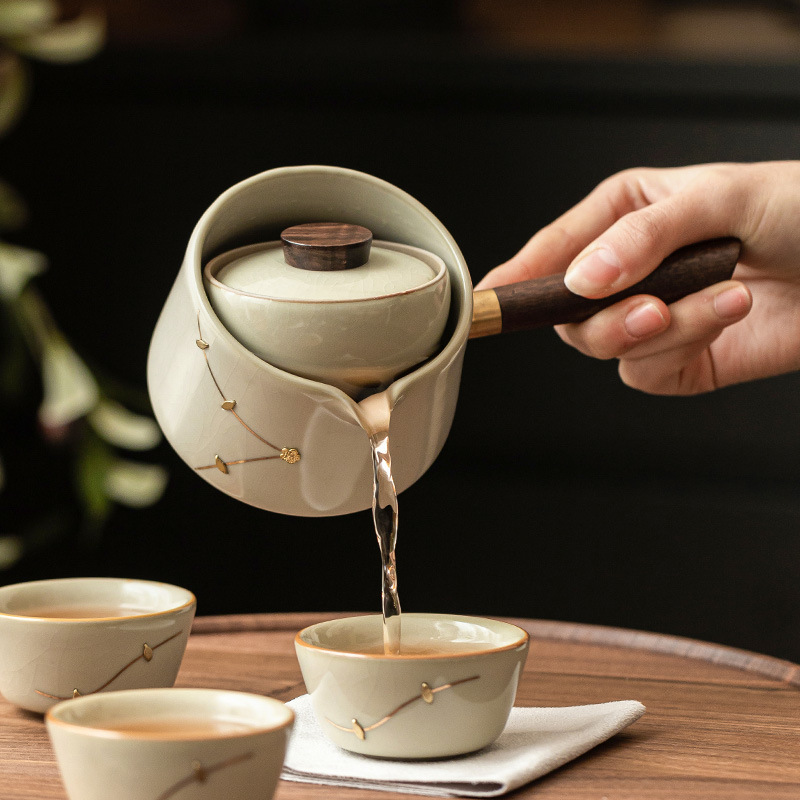 Ấm trà gốm sứ kiểu Trung Quốc ấm trà gốm sứ kiểu Trung Quốc ấm trà gia dụng ba chén ngoài trời cầm tay không nóng