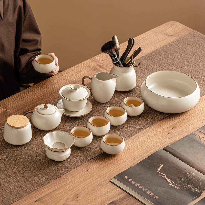 Bộ ấm chén trà Ru Kiln màu be 2025 mới, kiểu dáng đơn giản, dùng trong gia đình, gồm ấm trà Kung Fu có nắp, chén, chén trà và hộp đựng trà.