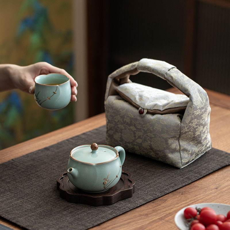 Bộ dụng cụ pha trà du lịch cầm tay một ấm một cốc ở lò Cucurn Bộ dụng cụ pha trà gốm sứ có thể mở được cho một người uống ngoài trời