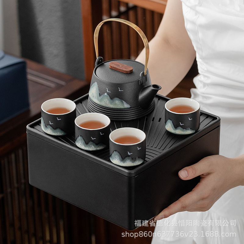Bộ ấm trà Kung Fu cầm tay nhẹ nhàng sang trọng đơn giản Bộ nhỏ ngoài trời Bộ một ấm bốn chén Hộp đựng trà gia dụng