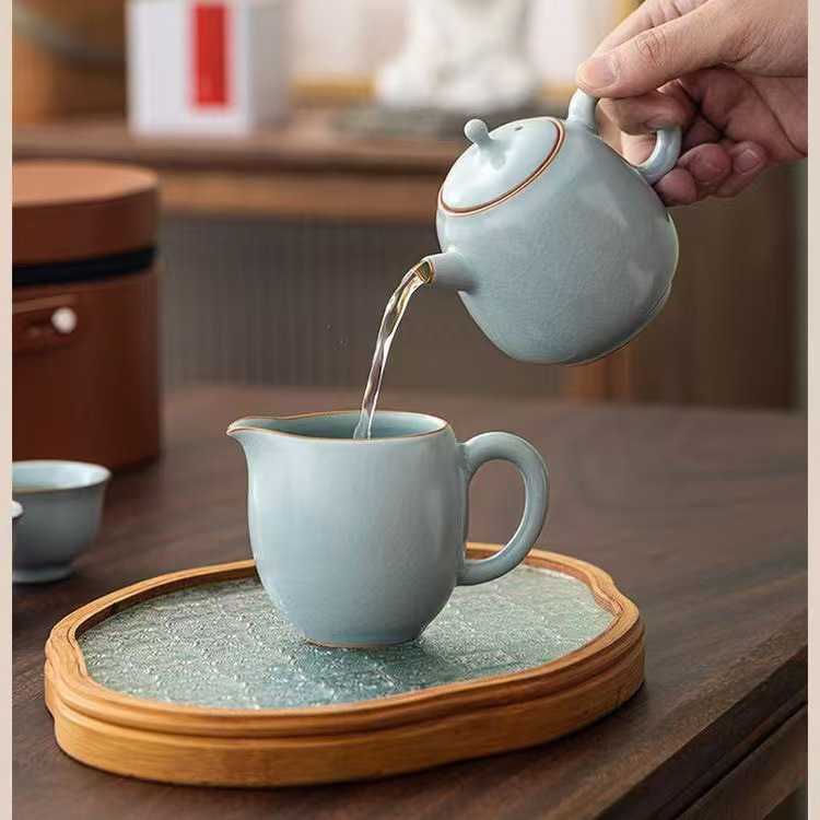 Bộ ấm trà Ru Kiln mở ra có thể nâng ấm trà sứ Ru kiểu Trung Quốc mới, một ấm bốn cốc, bộ trà du lịch Kung Fu, quà lưu niệm