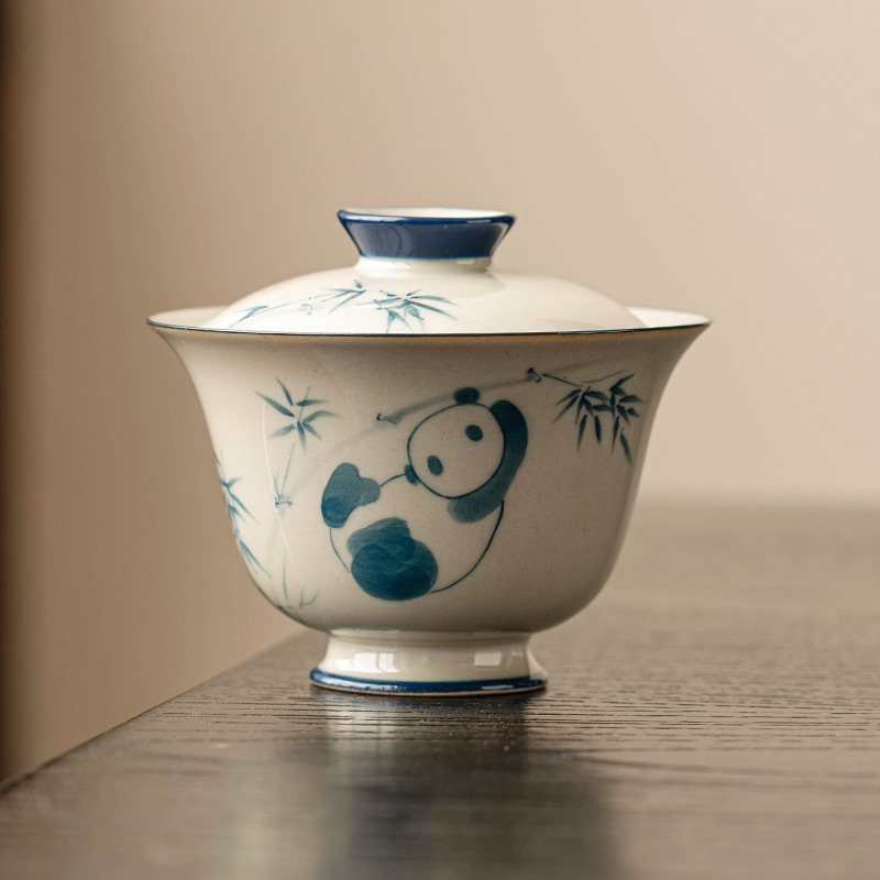 Cây tro cỏ vẽ tay gấu trúc chơi tre cao chân cao hai nắp bát trà gia dụng cao cấp bộ trà gốm sứ Kung Fu