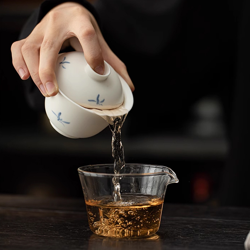 Vẽ tay phong lan nắp chén trà bộ trà du lịch bộ nhỏ pha trà ngoài trời di động gốm sứ nhanh ly quà lưu niệm