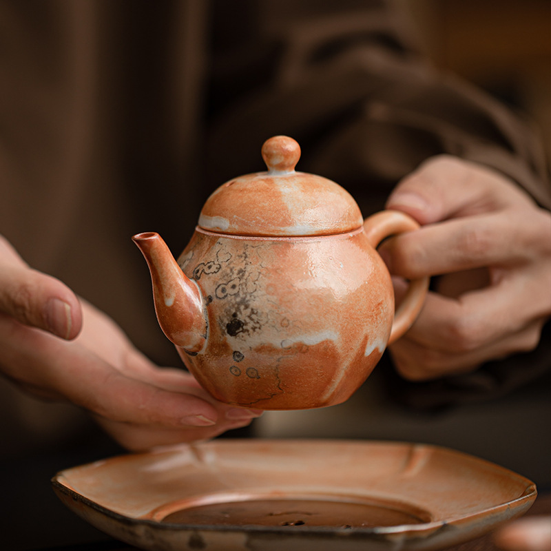 Shino-yaki hình quả lê ấm trà retro kung fu bộ trà hộ gia đình lò quay gốm bóng lỗ lọc ấm trà nồi đơn hộp quà tặng