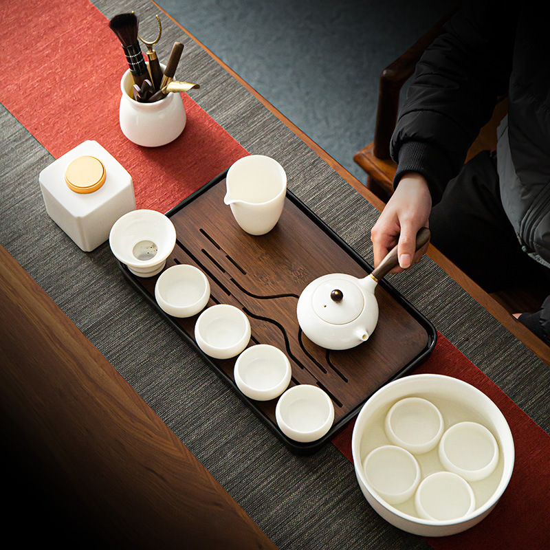 Bộ trà sứ trắng Dehua cao cấp gia dụng đơn giản mỡ cừu ngọc sứ nắp bát sứ trắng tay cầm bên ấm trà cốc sứ bán buôn