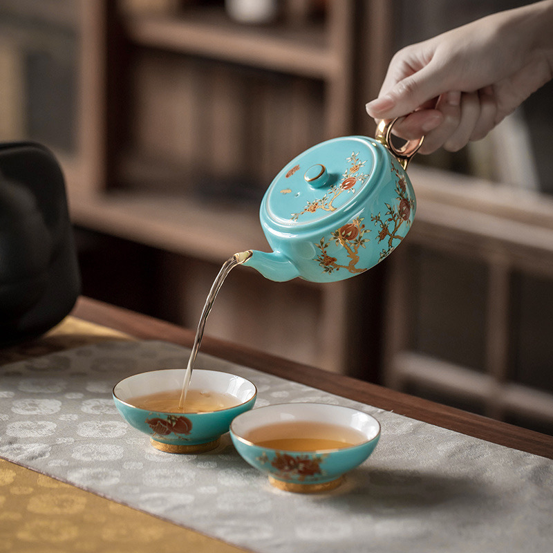 Ấm trà gốm sứ tráng men màu một ấm hai chén bộ trà du lịch bộ nhỏ kiểu Trung Quốc xách tay ngoài trời