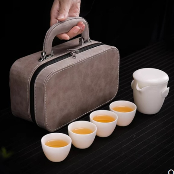 Bộ trà du lịch bằng sứ trắng mỡ cừu loại băng, cốc khách nhanh cầm tay, một ấm bốn cốc, bộ trà kung fu cắm trại trên xe