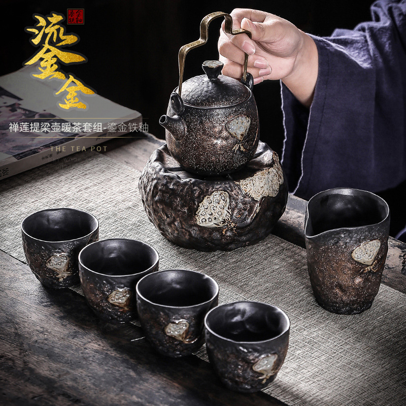 Bộ ấm trà Bộ ấm áp Bộ ấm trà nến ấm cơ sở trà ấm chén một ấm bốn tách Bộ trà Kung Fu bộ nhỏ