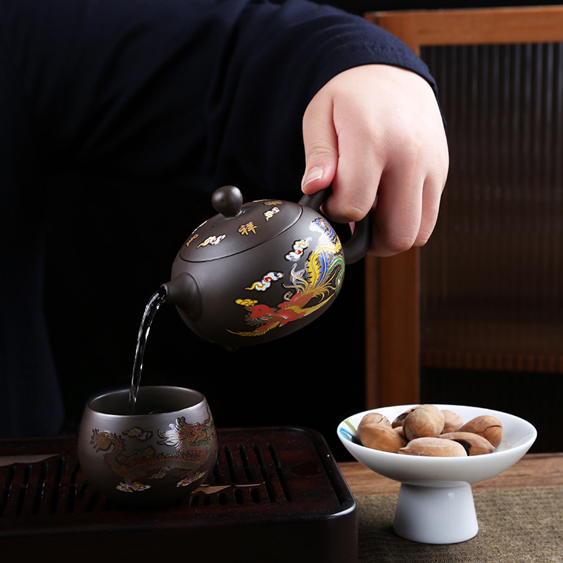 Ấm đất sét tím thô ấm Xi Shi ấm nước nóng đổi màu rồng và phượng hoàng chim nước gọi là ấm trà Fengming ấm trà bộ trà thủ công