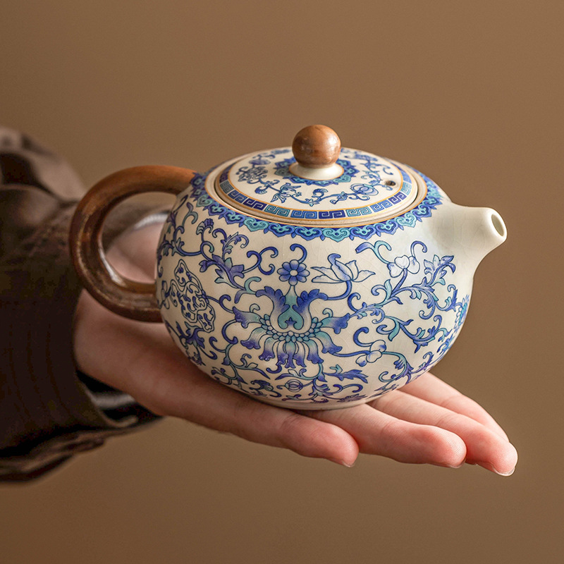 Ấm trà gốm sứ ấm trà ấm trà gia dụng Ru lò trắng xanh quấn cành sen Xi Shi bộ trà cao cấp kiểu Trung Quốc ấm trà cầm tay