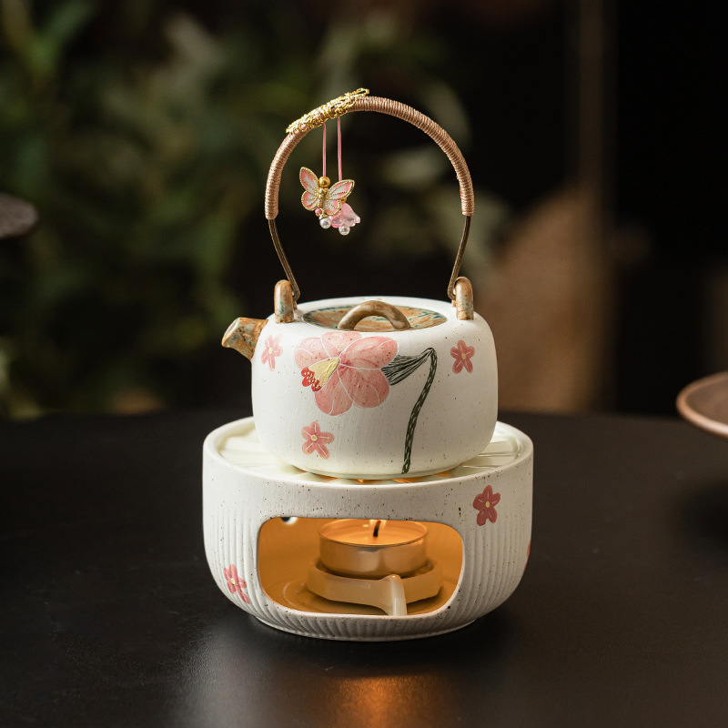 Quạt chạm khắc hình hoa chuông bếp ấm trà gốm sứ nến cồn nấu trà bếp đun trà dụng cụ đun trà chân đế đun ấm trà