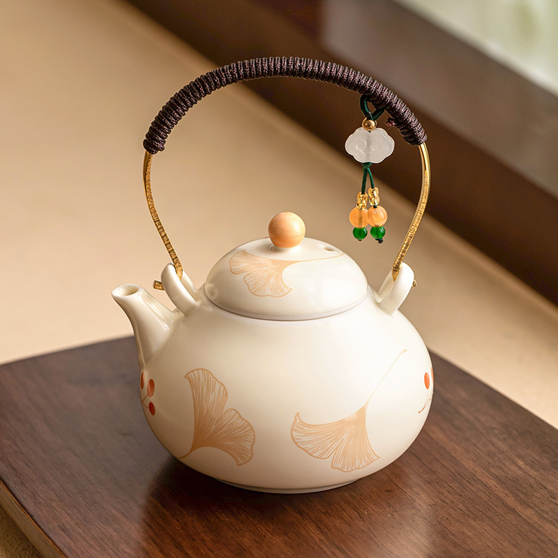 Ấm trà chùm dây buộc bạch quả màu be ấm trà gốm sứ pha trà dụng cụ trà kungfu gia dụng lọc ấm trà đơn ấm trà nhỏ kiểu Trung Quốc