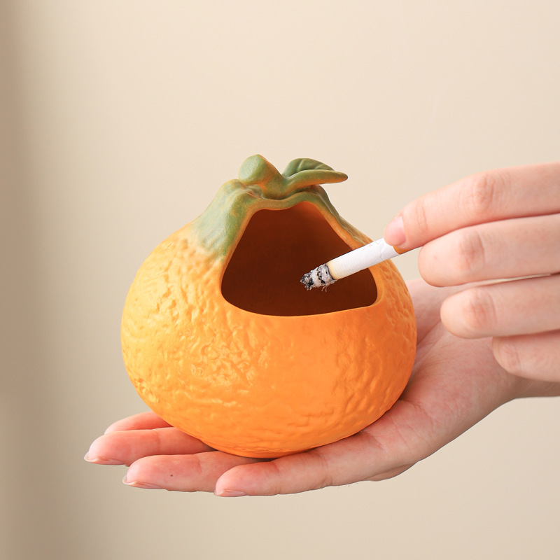 Gạt tàn cam Dajidi Gạt tàn phòng khách sáng tạo gốm sứ đồ trang trí chống gió có nắp chống bay