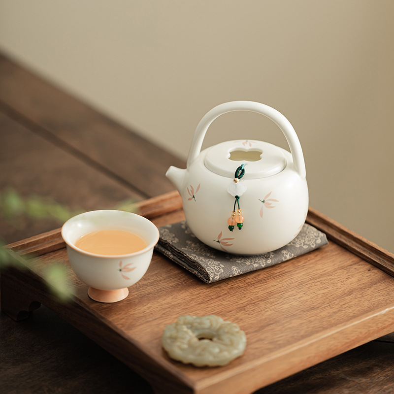 Phong lan chuông gió màu be vàng Ding lò nung chùm ấm pha trà cầm tay gốm sứ dụng cụ pha trà Kung Fu dụng cụ pha trà lỗ bóng dụng cụ pha trà