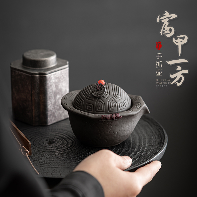 Zisha Fujia Yifang cầm tay cầm ấm đồ trang trí bằng đất sét Tím quặng thô đồ chơi trà Bộ trà Kung Fu Ấm trà lọc Lỗ Bóng ấm đơn