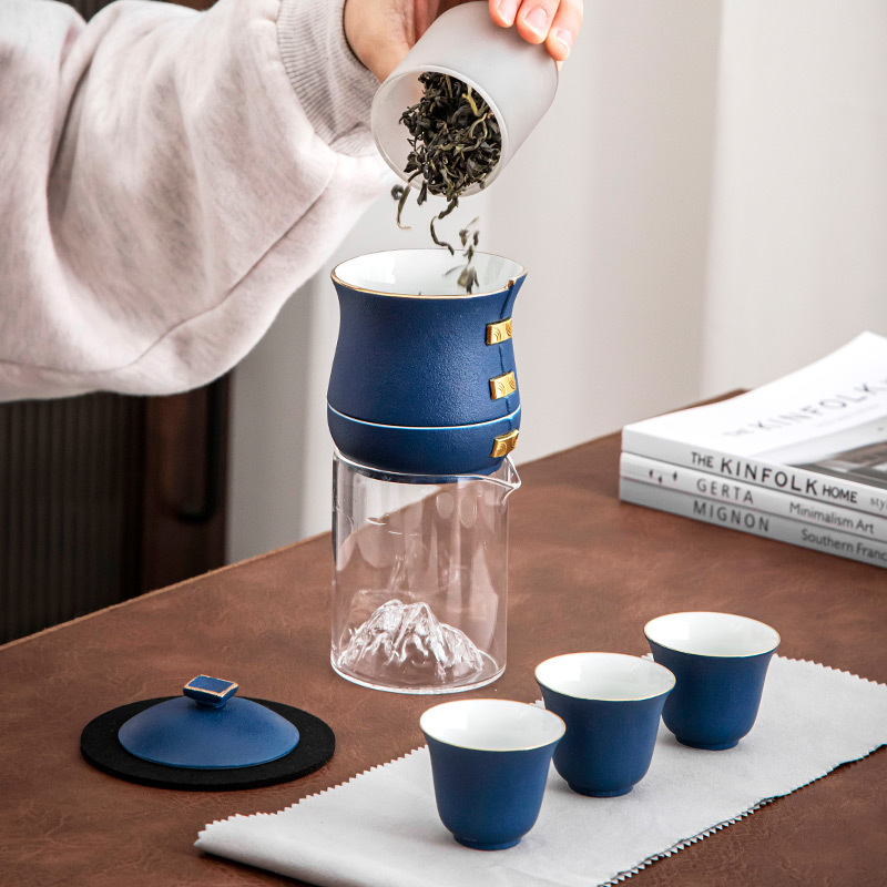 Bộ ấm trà du lịch bán tự động gốm sứ, túi xách tay, một ấm bốn cốc, bát mài đá lười nhanh