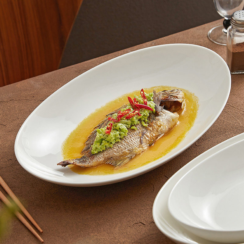 Đĩa cá trắng Dehua Đĩa cá hấp gia dụng Đĩa hình bầu dục gốm Đĩa rau lạnh Nhà hàng Nhà hàng chuyên dụng cỡ lớn