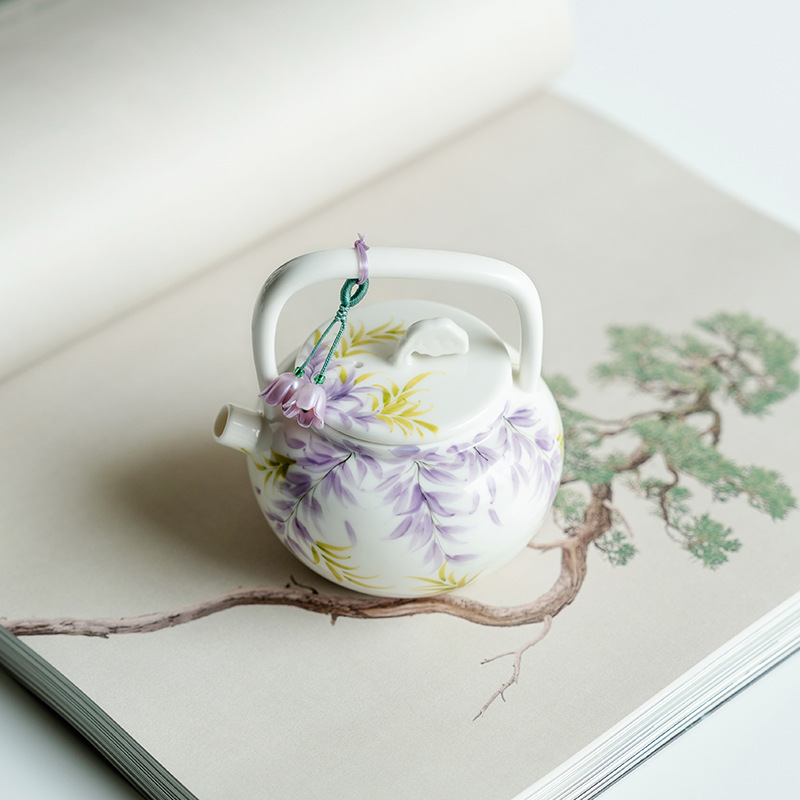 Ấm trà cầm xà nghiêng hoa tử đằng vẽ tay tinh khiết ấm trà gốm sứ ấm trà pha trà chuyên dụng gia dụng có dây xách tay