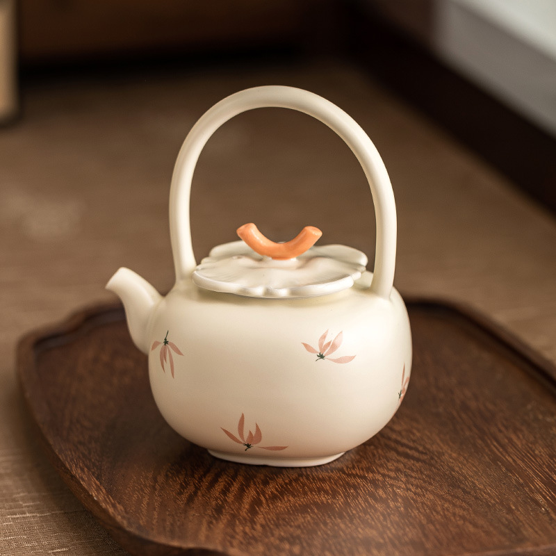 Ấm trà hoa lan tráng men màu vàng ấm trà ấm trà dụng cụ trà Kung Fu gốm sứ gia dụng ấm trà pha trà dung tích lớn cao cấp