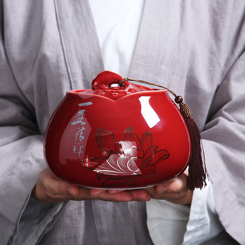 Bình trà gốm Jilan kín gia dụng nửa catty một catty retro lớn số lớn bình trà lưu trữ màu đỏ