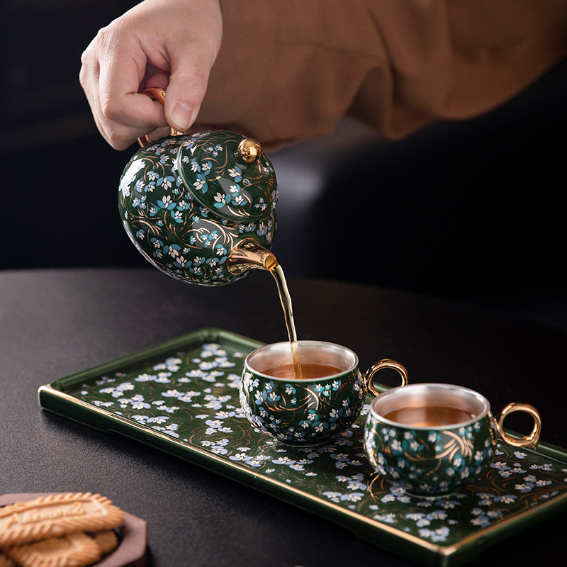 Bộ trà cao cấp mạ bạc bàn trà hộp quà trọn bộ ấm trà đơn chuyên dụng cho nữ sinh giá trị cao