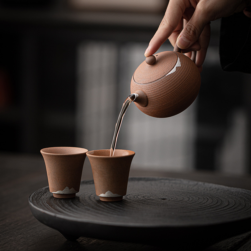 Ấm tròn nhỏ bằng bùn đá cũ trống rỗng ấm trà mạ bạc cổ điển dụng cụ trà Kung Fu gia dụng ấm đơn bóng lỗ lọc pha trà