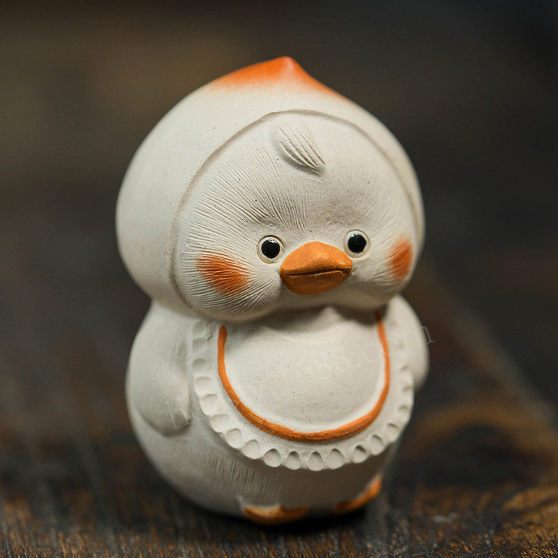 Đồ trang trí vịt vật nuôi trà cát tím quặng thô Yixing Đào Bộ trà điêu khắc Vịt Vàng nhỏ bàn trà sáng tạo chơi trà bán buôn