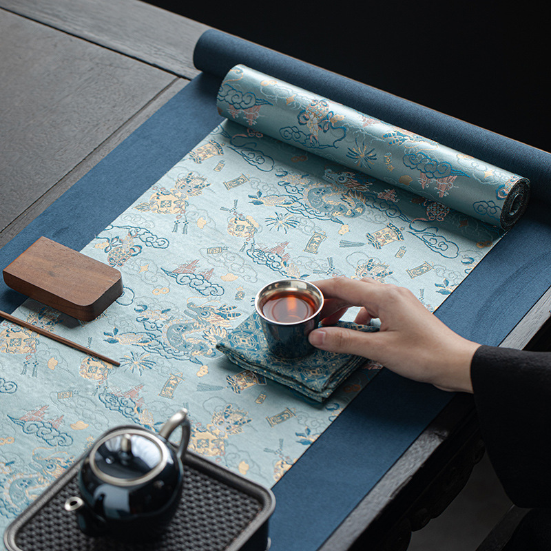 Bán buôn phong cách Trung Quốc mới thiền hoàng đạo trà chiếu trà rồng jacquard thổ cẩm thêu lá cờ bàn chiếu khô bộ phụ kiện trà