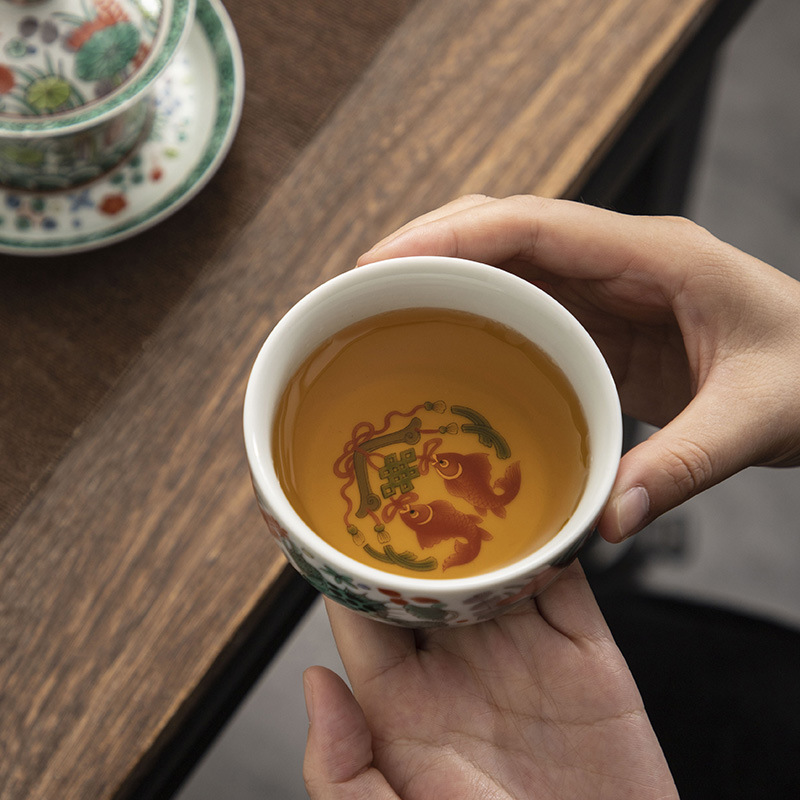 Jingdezhen tráng men màu tam tài bát cốc trà cốc đơn chủ nhân bộ trà công phu bộ trà gốm sứ cao cấp