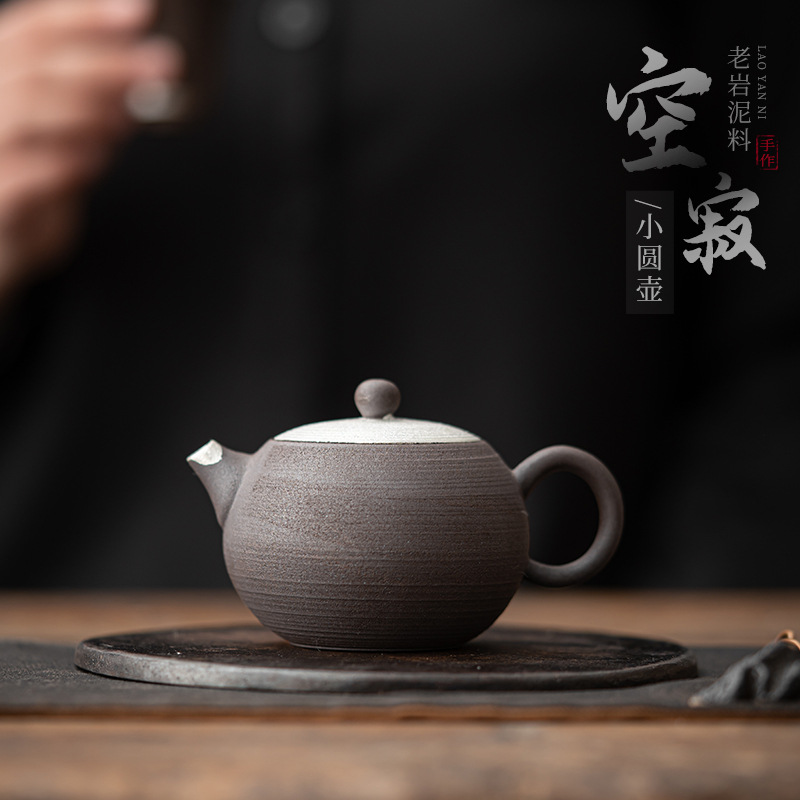 Ấm tròn nhỏ bằng đất sét đá cũ trống rỗng ấm trà nhỏ mạ bạc thủ công bằng gốm thô ấm đơn Bộ trà Kung Fu có lọc ấm pha trà