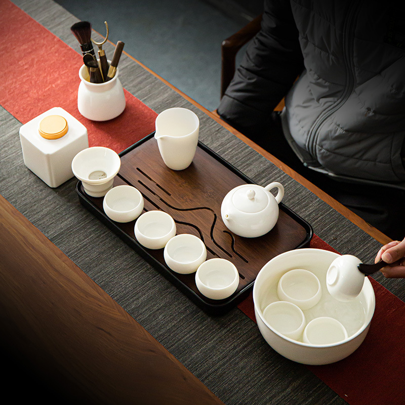 Bộ ấm trà sứ trắng Dehua gia dụng văn phòng mỡ cừu ngọc sứ có nắp đậy ấm Xi Shi tách trà gốm sứ bán buôn
