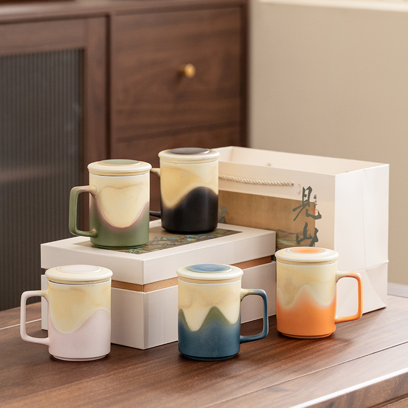 Cốc tách trà nước Jianshan cốc pha trà gốm sứ giá trị cao cốc lọc có nắp hộp quà logo
