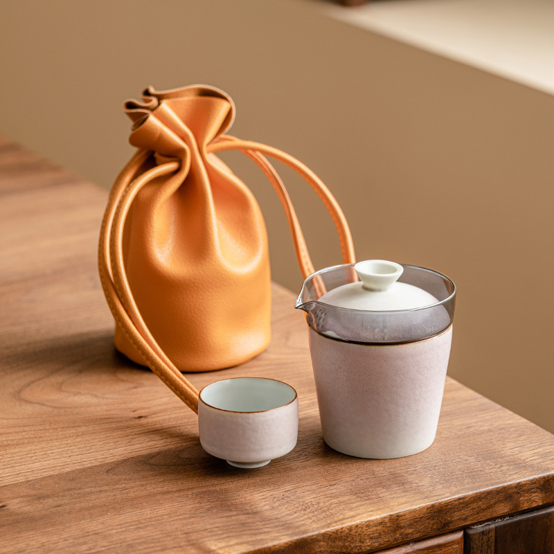 Lò biến thành bộ trà du lịch cầm tay màu tím quyến rũ văn phòng cắm trại ngoài trời bộ trà kung fu cầm tay cốc khách nhanh một bình hai cốc