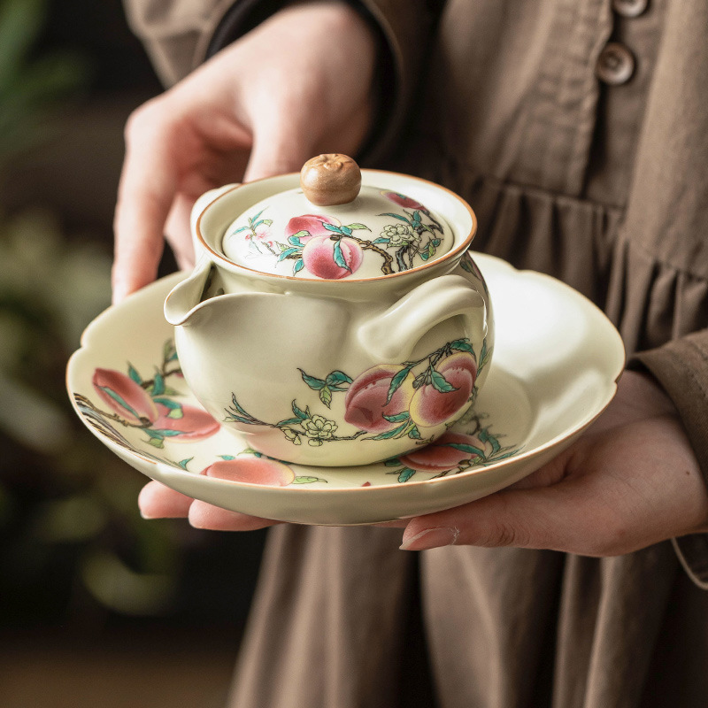 Ấm cầm tay Ruyao Pastel Nine Peach Ruyi Ấm trà bộ trà Kung Fu gốm sứ Ấm trà gia dụng không nóng lọc tay