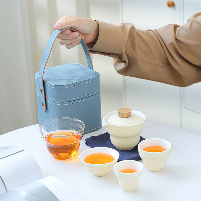 Bộ trà du lịch ngoài trời di động Bình vàng kem Nhật Bản một cốc ba cốc đơn giản ấm trà ngoài trời quà tặng