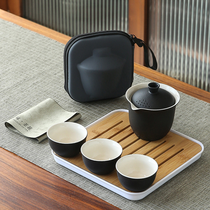 Bộ trà sóng biển gốm thô Bộ một ấm Ba cốc đựng đồ xách tay ngoài trời dụng cụ pha trà đơn giản Bộ trà Kung Fu gốm sứ