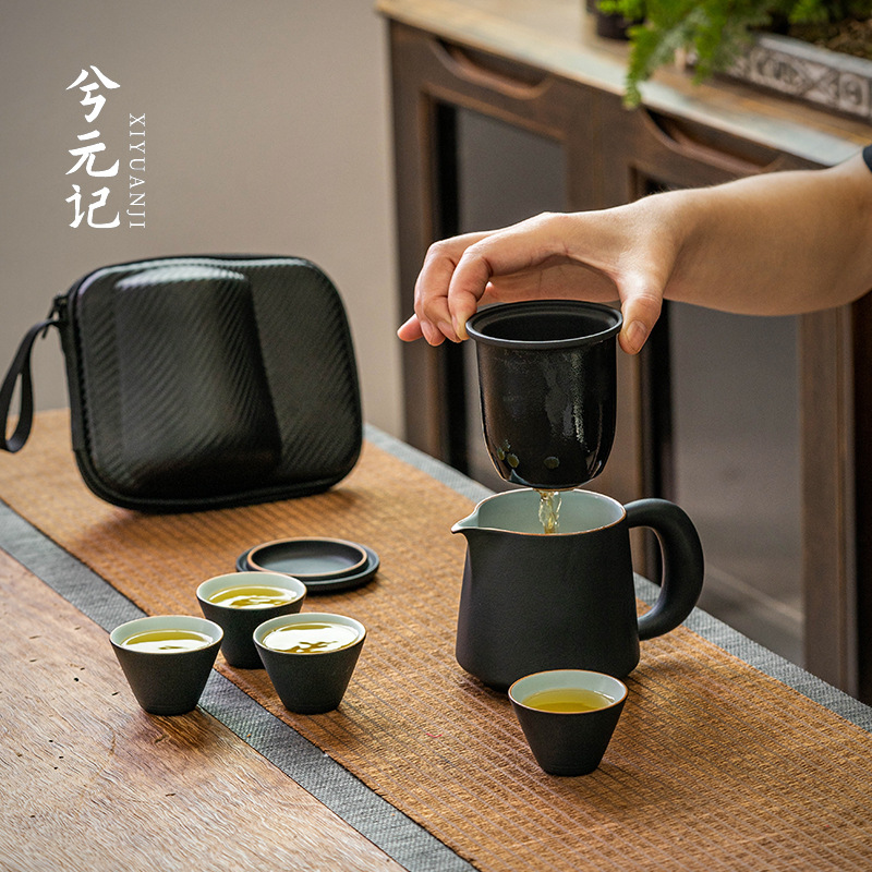 Một nồi gốm đen bốn cốc cốc khách nhanh Cốc gốm pha trà ngoài trời trà Kung Fu du lịch cắm trại dã ngoại Bộ trà xách tay